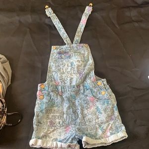 Overalls with written design all over